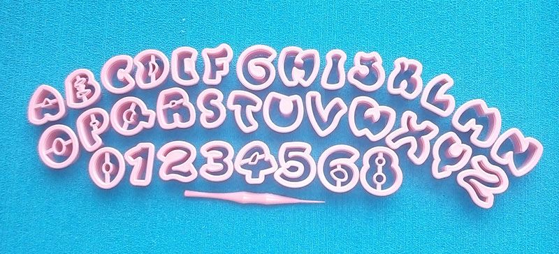 Molde plástico abecedario alfabeto comico para decorar pasta y tortas