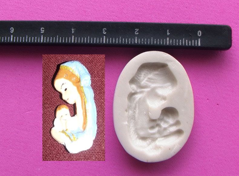 Molde en resina virgen con niño para fondant fimo porcela